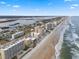 Expansive aerial view of the beach and oceanfront buildings at 3799 S Atlantic Ave # 602, Daytona Beach, FL 32118