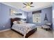 Bedroom with a queen bed, decorative accents, and ceiling fan at 3799 S Atlantic Ave # 602, Daytona Beach, FL 32118