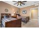 Two twin beds in a spacious bedroom with ceiling fan and neutral decor at 3799 S Atlantic Ave # 602, Daytona Beach, FL 32118