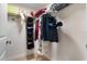 Well-organized closet with shelving and hanging space at 3799 S Atlantic Ave # 602, Daytona Beach, FL 32118