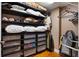 Walk-in closet with ample shelving and drawers at 3799 S Atlantic Ave # 602, Daytona Beach, FL 32118