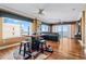 Ocean view dining area with unique barrel table and hardwood floors at 3799 S Atlantic Ave # 602, Daytona Beach, FL 32118