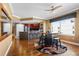 Open concept dining area with hardwood floors and kitchen island at 3799 S Atlantic Ave # 602, Daytona Beach, FL 32118