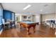 Relaxing game room with pool table, seating, and large windows at 3799 S Atlantic Ave # 602, Daytona Beach, FL 32118