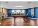 Game room features a pool table and comfortable seating at 3799 S Atlantic Ave # 602, Daytona Beach, FL 32118