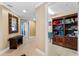 Hallway with built-in shelving and access to rooms at 3799 S Atlantic Ave # 602, Daytona Beach, FL 32118