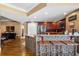 Kitchen boasts granite counters and wood cabinetry at 3799 S Atlantic Ave # 602, Daytona Beach, FL 32118
