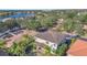 Two-story house, tile roof, pool, lush landscaping at 3915 Shoreview Dr, Kissimmee, FL 34744