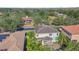 Two-story house, tile roof, pool, lush landscaping at 3915 Shoreview Dr, Kissimmee, FL 34744