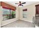 Bright breakfast nook with tile floors and window at 3915 Shoreview Dr, Kissimmee, FL 34744