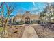 Community clubhouse with brick paver walkway and landscaping at 3915 Shoreview Dr, Kissimmee, FL 34744