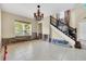 Dining room with chandelier and access to kitchen, some water damage at 3915 Shoreview Dr, Kissimmee, FL 34744
