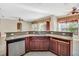 Kitchen island with granite countertop and sink at 3915 Shoreview Dr, Kissimmee, FL 34744