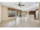 Open living space with kitchen view and tile floors at 3915 Shoreview Dr, Kissimmee, FL 34744