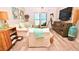 Bright living room with ocean view and comfortable seating at 4153 S Atlantic Ave # 1020, New Smyrna Beach, FL 32169