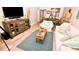 Living room with comfortable seating and ocean view at 4153 S Atlantic Ave # 1020, New Smyrna Beach, FL 32169