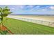 Stunning ocean view from the property's grassy backyard at 4153 S Atlantic Ave # 1030, New Smyrna Beach, FL 32169