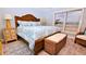 Spacious bedroom with ocean views and comfortable bedding at 4153 S Atlantic Ave # 1030, New Smyrna Beach, FL 32169