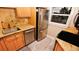 Stainless steel appliances and granite countertops in this well-lit kitchen at 4153 S Atlantic Ave # 1030, New Smyrna Beach, FL 32169
