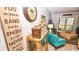 Living room features ocean views and a comfortable teal armchair at 4153 S Atlantic Ave # 1030, New Smyrna Beach, FL 32169