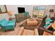 Relaxing living room featuring ocean views and comfy seating at 4153 S Atlantic Ave # 1030, New Smyrna Beach, FL 32169
