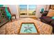 Living room with ocean view and comfortable seating at 4153 S Atlantic Ave # 1030, New Smyrna Beach, FL 32169
