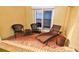 Relaxing patio with ocean view and comfortable seating at 4153 S Atlantic Ave # 1030, New Smyrna Beach, FL 32169