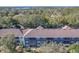 Aerial view of community, showcasing building and lake view at 4208 Clubside Dr # 4208, Longwood, FL 32779