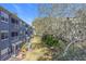 Community backyard with lush trees and landscaping at 4208 Clubside Dr # 4208, Longwood, FL 32779