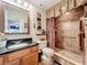 Bathroom with walk-in shower and granite countertop at 4208 Clubside Dr # 4208, Longwood, FL 32779