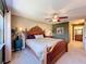 Nicely appointed bedroom featuring carpet, a bed, and attached bathroom at 4208 Clubside Dr # 4208, Longwood, FL 32779