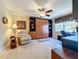 Multi-functional bedroom with built-in wall bed, home office space, and ceiling fan at 4208 Clubside Dr # 4208, Longwood, FL 32779
