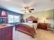 Spacious bedroom with king-size bed and ample light at 4208 Clubside Dr # 4208, Longwood, FL 32779