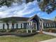 Community clubhouse with landscaping and welcoming entrance at 4208 Clubside Dr # 4208, Longwood, FL 32779