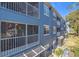 View of the building's exterior with screened in balconies at 4208 Clubside Dr # 4208, Longwood, FL 32779