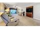 Spacious living room with plush carpeting and sliding glass doors to screened porch at 4208 Clubside Dr # 4208, Longwood, FL 32779