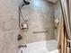 Tiled shower with built-in shelving and accessible features for comfortable use at 4208 Clubside Dr # 4208, Longwood, FL 32779