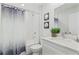 Clean bathroom with white vanity, tub, and shower at 4386 Sw 169Th Lane Rd, Ocala, FL 34473