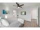Bright bedroom with a queen-size bed and a view of the backyard at 4386 Sw 169Th Lane Rd, Ocala, FL 34473