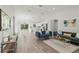 Open floor plan with modern kitchen, island, and spacious living area at 4386 Sw 169Th Lane Rd, Ocala, FL 34473