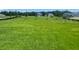 Large backyard with green grass at 5067 Northern Dove Ave, Mount Dora, FL 32757