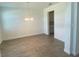 Well-lit dining room featuring lovely wood floors and a modern light fixture at 5067 Northern Dove Ave, Mount Dora, FL 32757