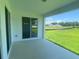 Covered porch overlooking the yard at 5067 Northern Dove Ave, Mount Dora, FL 32757