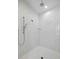 Modern shower featuring white subway tile, dual shower heads, and recessed lighting at 5067 Northern Dove Ave, Mount Dora, FL 32757