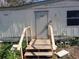 Wooden steps leading to the front door at 5149 Bryant Ave, Sanford, FL 32773