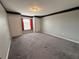 Spacious bedroom with double closets and carpet at 553 Vista Way Ln Ln, Eagle Lake, FL 33839