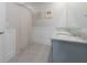 Bathroom boasts double vanity and granite countertop at 603 Lazio Cir, Debary, FL 32713