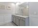 Double vanity bathroom with granite countertops at 603 Lazio Cir, Debary, FL 32713