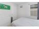 Spacious bedroom with a bed, large window, and a basketball hoop at 603 Lazio Cir, Debary, FL 32713