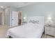 Charming bedroom with a full-size bed and ensuite bathroom access at 603 Lazio Cir, Debary, FL 32713
